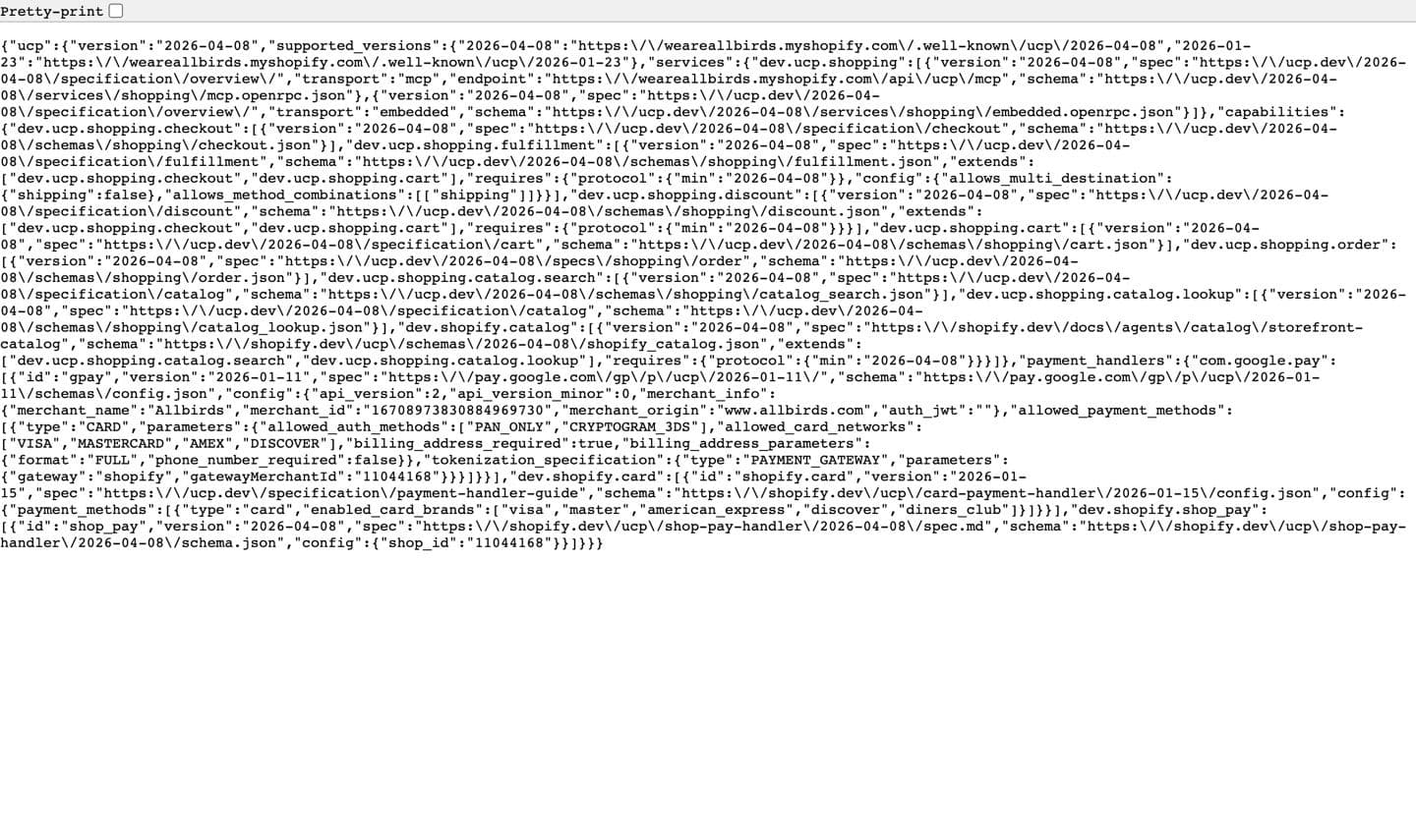 The JSON served at allbirds.com/.well-known/ucp, listing supported Universal Commerce Protocol versions, service endpoints and capabilities.